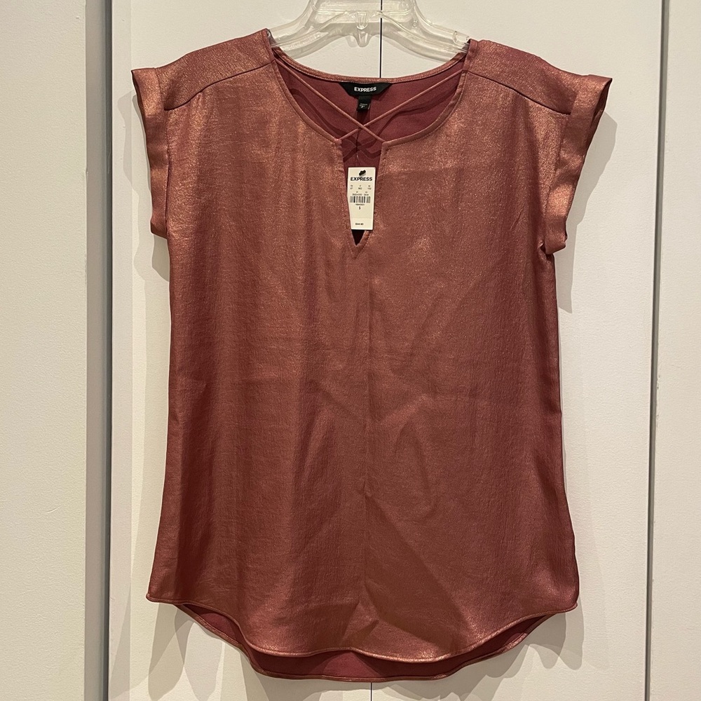 Express brand new rose gold shimmery top
